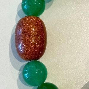 Gold stone averting bracelet